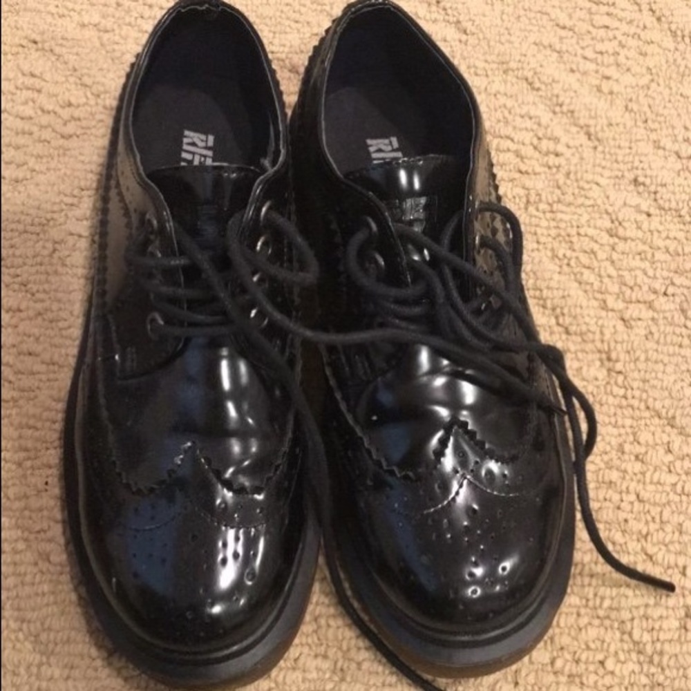 Pair of black leather dress shoes